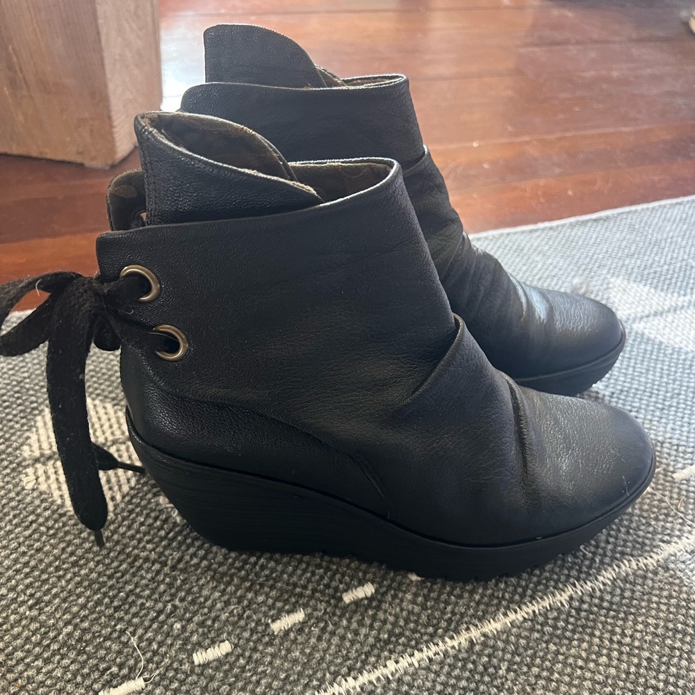 Fly London wedge booties with lace up back and signature heel